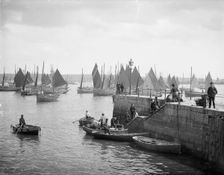 Fishermen unload their catches, Falmouth Pier, Falmouth, Cornwall, c1860-c1922. Artist: Henry Taunt