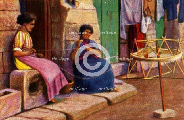 Fisherwomen winding yarn for nets, Malta, c1928. Creator: Unknown.