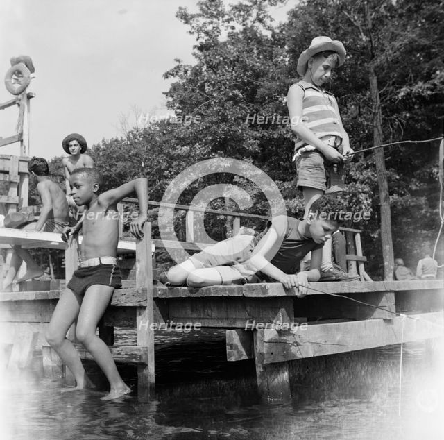 Fishing at Camp Nathan Hale, Southfields, New York, 1943. Creator: Gordon Parks.