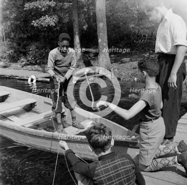 Fishing at Camp Nathan Hale, Southfields, New York, 1943. Creator: Gordon Parks.