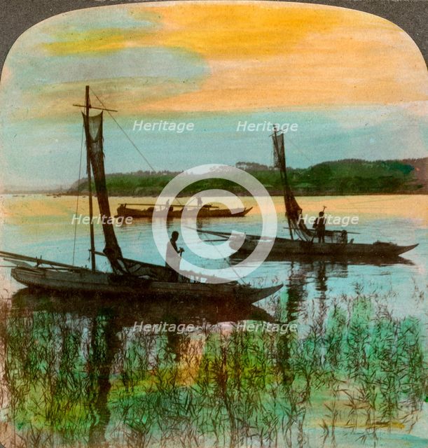 Fishing boats at sunset near Yokohama, Japan, 1904.Artist: Underwood & Underwood
