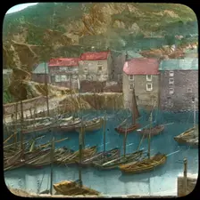 Fishing boats in the harbour, Polperro, Cornwall, late 19th or early 20th century. Artist: Church Army Lantern Department