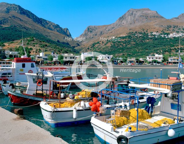 Fishing boats in the harbour, Plakias, Crete, Greece. Creator: Peter Thompson.