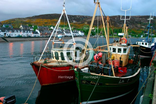 Fishing boats in Ullapool harbour at night, Highland, Scotland. Creator: Peter Thompson.