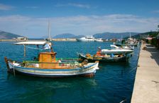 Fishing boats moored alongside the quay, Sami, Kefalonia, Greece. Creator: Peter Thompson