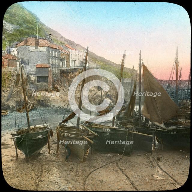 Fishing fleet at low tide, Polperro, Cornwall, late 19th or early 20th century. Artist: Church Army Lantern Department