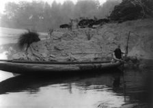 Fishing from canoe-Hupa, 1923. Creator: Edward Sheriff Curtis
