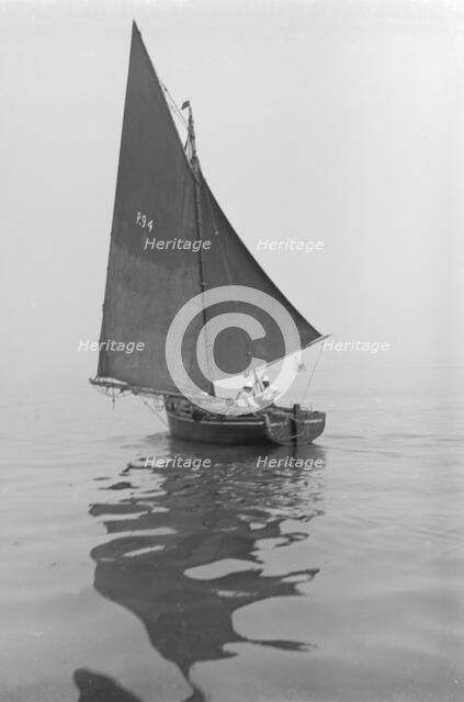 Fishing Smack under sail, 1911. Creator: Kirk & Sons of Cowes.