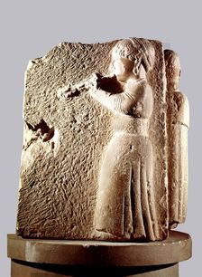 Flute player, corner relief from Osuna (Sevilla)