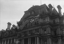 Flags - American, British, And French Flags On State Department. Visit of Allied Commission, 1917. Creator: Harris & Ewing