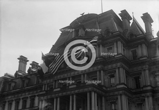 Flags - American, British, And French Flags On State Department. Visit of Allied Commission, 1917. Creator: Harris & Ewing.