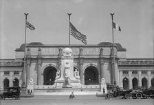 Flags - American, British, And French Flags in Front of Union Station, Awaiting Arrival..., 1917. Creator: Harris & Ewing