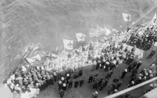 Flags greet Wilson, between c1915 and c1920. Creator: Bain News Service