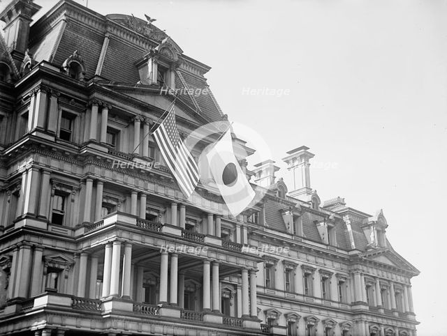 Flags - Japanese And United States Flags On State, War, And Navy Building; Japanese Mission, 1917. Creator: Harris & Ewing.