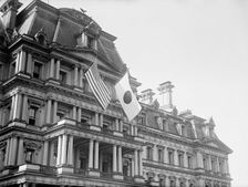 Flags - Japanese And United States Flags On State, War, And Navy Building; Japanese Mission, 1917. Creator: Harris & Ewing