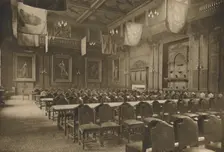 Flag-Hung Great Hall in Which the Powerful Company of Grocers Holds Its Banquets c1935. Creator: Unknown