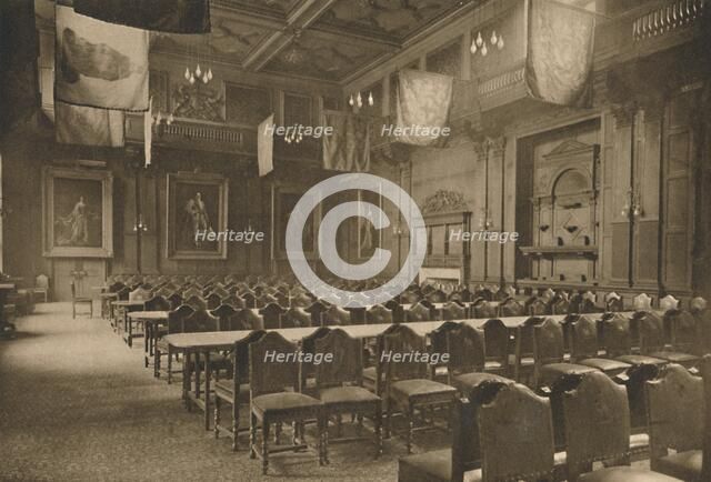 'Flag-Hung Great Hall in Which the Powerful Company of Grocers Holds Its Banquets', c1935. Creator: Unknown.