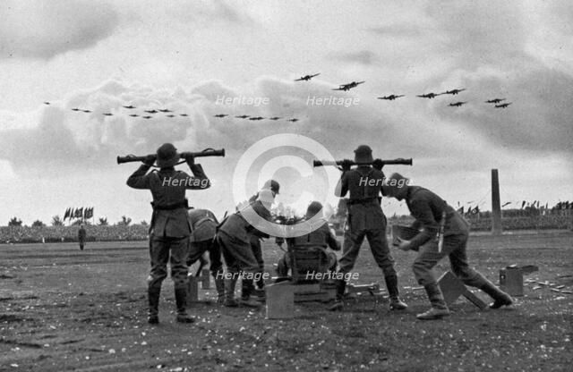 Flak batteries put on a show at the Nuremberg Rally, Germany, 1935. Artist: Unknown
