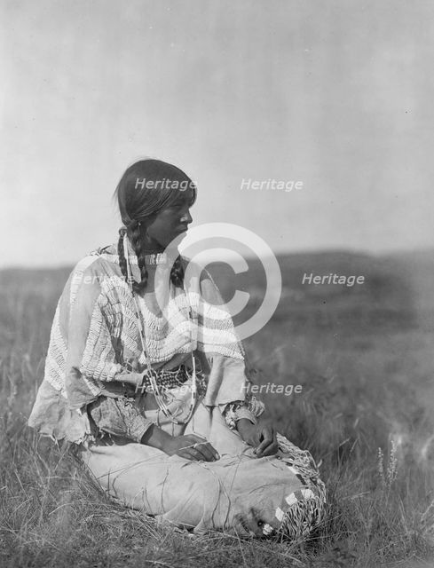 Flint Smoker's daughter, c1910. Creator: Edward Sheriff Curtis.