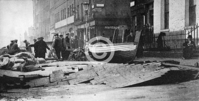 Flood damage on the Victoria Embankment, London, 1928 (1936). Artist: Unknown