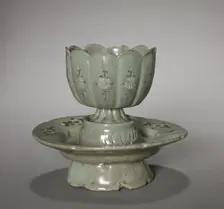Floral-shaped Cup and Saucer with Inlaid Chrysanthemum Design, 1100s-1200s. Creator: Unknown