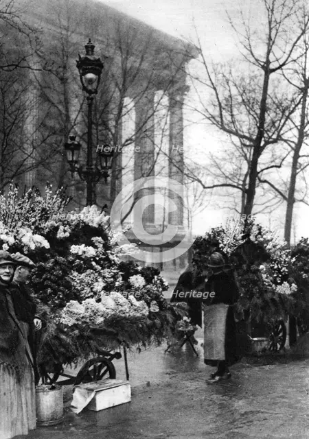 Flower market at the Madeleine, Paris, 1931. Artist: Ernest Flammarion