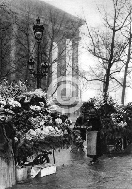 Flower market at the Madeleine, Paris, 1931. Artist: Ernest Flammarion