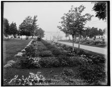 Flower borders at the Frontenac, Round Island, N.Y., between 1890 and 1901. Creator: Unknown