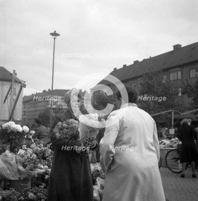 Flower stall in the market, Malmö, Sweden, 1947. Creator: Otto Ohm.
