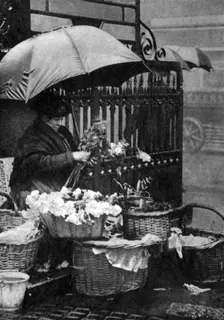 Flower seller, Piccadilly Circus, London, 1926-1927