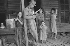 Floyd Burroughs and Tengle children, Hale County, Alabama, 1936. Creator: Walker Evans
