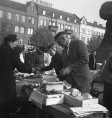 Fruit and vegetable stall in the market, Malmö, Sweden, 1947. Creator: Otto Ohm