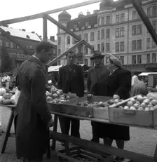 Fruit and vegetable stall in the market, Malmö, Sweden, 1947. Creator: Otto Ohm