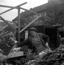 Fruit and vegetable stall in the market, Malmö, Sweden, 1947. Creator: Otto Ohm