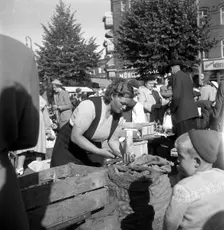 Fruit and vegetable stall in the market, Malmö, Sweden, 1947. Creator: Otto Ohm