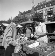 Fruit and vegetable stall in the market, Malmö, Sweden, 1947. Creator: Otto Ohm