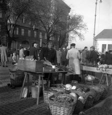 Fruit and vegetable stall in the market, Malmö, Sweden, 1947. Creator: Otto Ohm