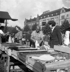 Fruit and vegetable stall in the market, Malmö, Sweden, 1947. Creator: Otto Ohm