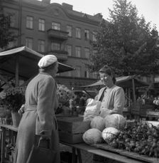 Fruit and vegetable stall in the market, Malmö, Sweden, 1947. Creator: Otto Ohm