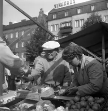 Fruit and vegetable stall in the market, Malmö, Sweden, 1947. Creator: Otto Ohm