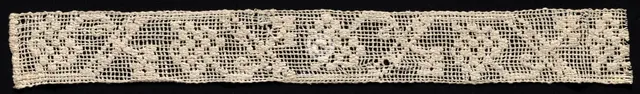 Fragment of a Band with Geometric Pattern and Floral Motif, 19th century. Creator: Unknown.