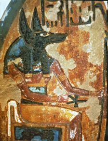 Fragment of a familiar stela in a chapel of worship, showing God Anubis