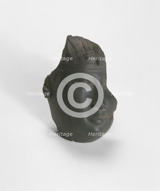 Fragment of a Head from a Statue of a King, Egypt, Late Period, Dynasty 30 (380-343 BCE). Creator: Unknown.