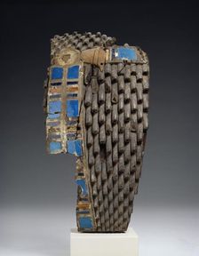 Fragment of a royal wig sculpted in wood, XVIIIth - XIXth Dynasty (c1540 BC-c1190 BC)