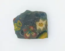 Fragment of an inlay with floral design, Ptolemaic Dynasty to Roman Period, 305 BCE-14 CE. Creator: Unknown