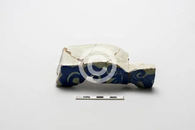 Fragment of an underglaze cobalt-blue-painted wall tile, (18th century?). Creator: Unknown.