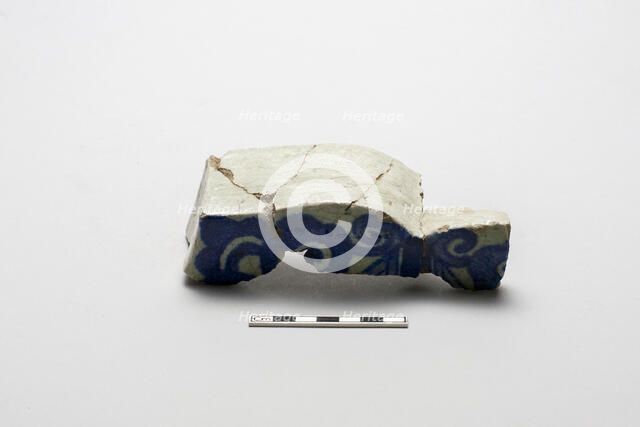 Fragment of an underglaze cobalt-blue-painted wall tile, (18th century?). Creator: Unknown.