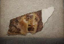 Fragment with tragic theatrical mask, 1st century. Creator: Roman-Pompeian wall painting