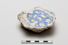 Fragment with a design of a torso, Saljuq period, early 13th century. Creator: Unknown