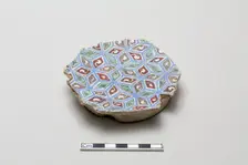Fragmentary base of a bowl with with abstracted all-over design, early 13th century. Creator: Unknown